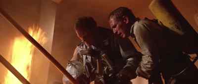 You'll never make it through there.
How much time? - The Towering Inferno