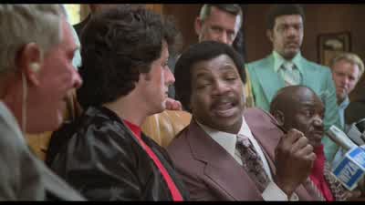 Rocky your pay for the fight is very substantialWhat are you gonna do with the moneyThe first thing I gotta do is I gotta pay the rentAnd then well I made this list on the way overI was just thinking of things to doI'd like to get a couple of hats and a - Rocky II