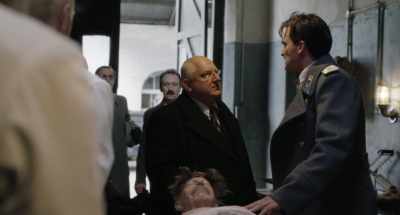 You're dividing the spoils.
Leave his brain alone! - The Death of Stalin