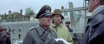 YOU'RE IN COMMAND HERE ?
            OBERLEUTNANT KUNI,
            HERR OBERST. - The Eagle Has Landed