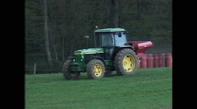 A farmer spreads fertiliser on his fields