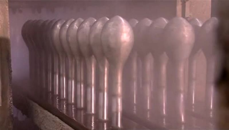A FIXTURE THEN FLIPS AND DIPS THE FORMS