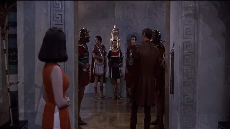 A guard to escort Queen Cleopatra to her apartments