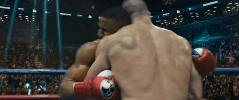 A massive right hand sends Creed reeling
