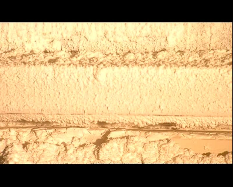 A MOLDING BOARD NOW PRESSES DOWN INTO THE STARCH