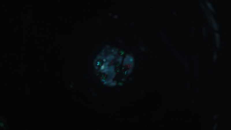 A particle from its nucleus breaks away