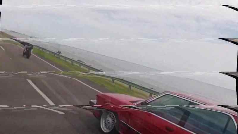 A passing biker responds