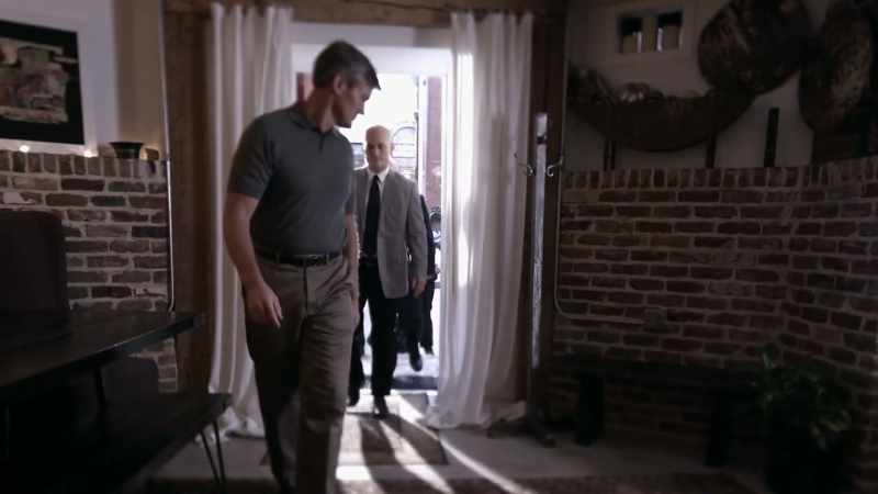 A POLICE DETECTIVE AND A SERGEANT