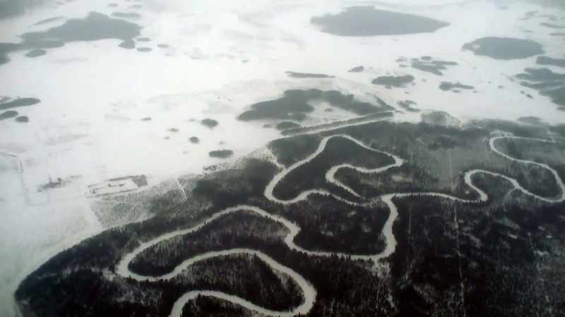 A RIVER FROZEN IN TIME SCARS THE LANDSCAPE