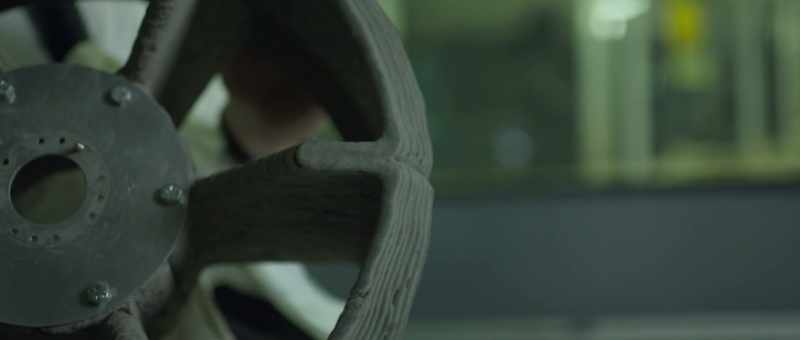 A robot part made by a robot for another robot, using space materials