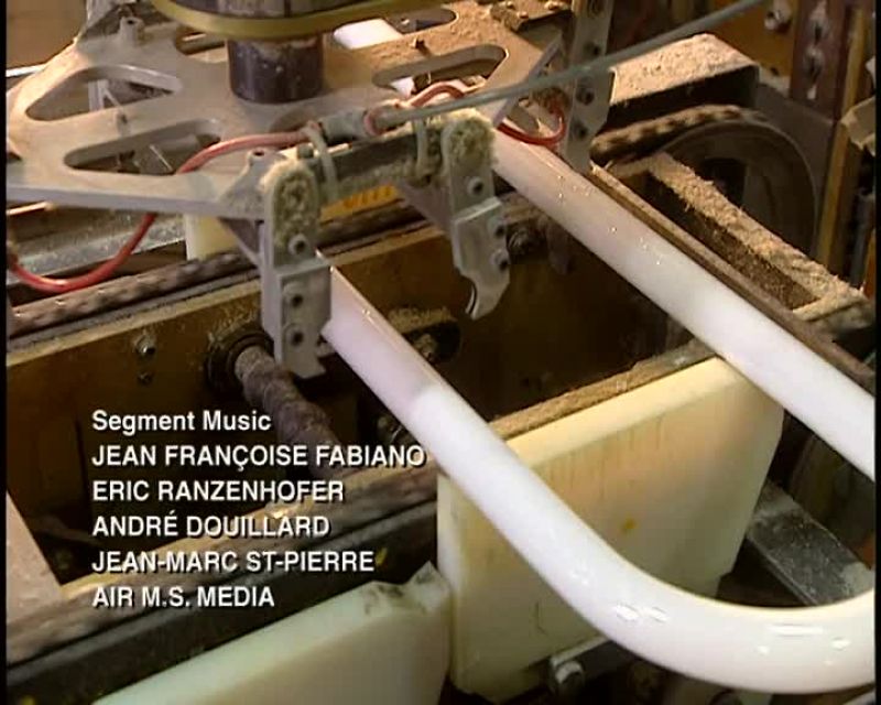 A ROBOTIC MACHINE HANDLES THE LAMPS