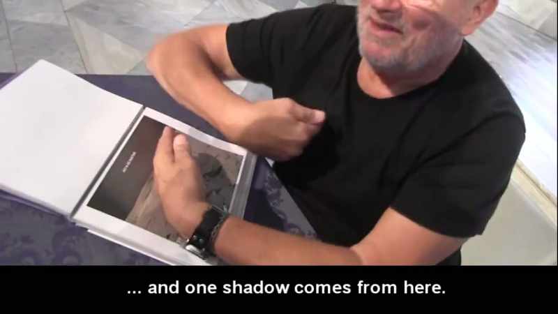 A shadow walks in one direction, another goes in another direction