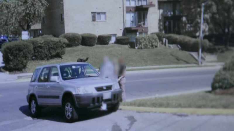 A silver SUV is parked where her car was found