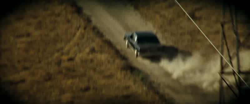 A van's coming down the road