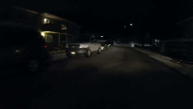A white Elantra with no front license plate