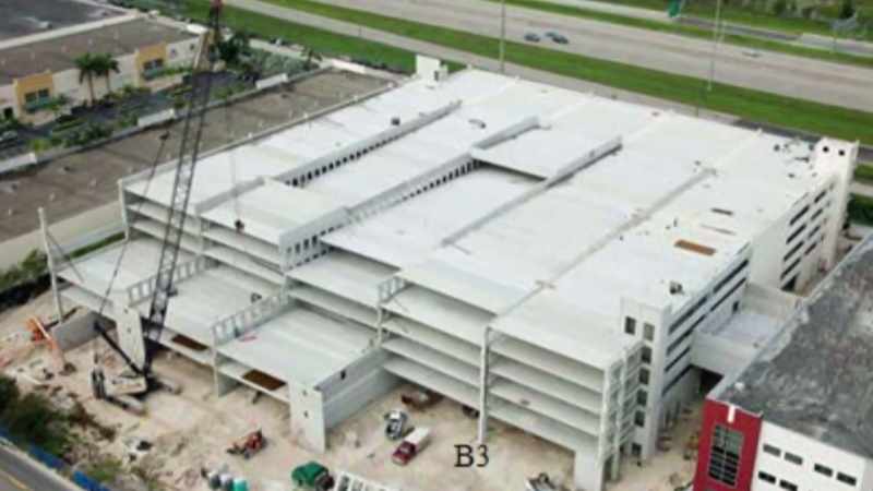 According to reports, a crane lifting a wall panel