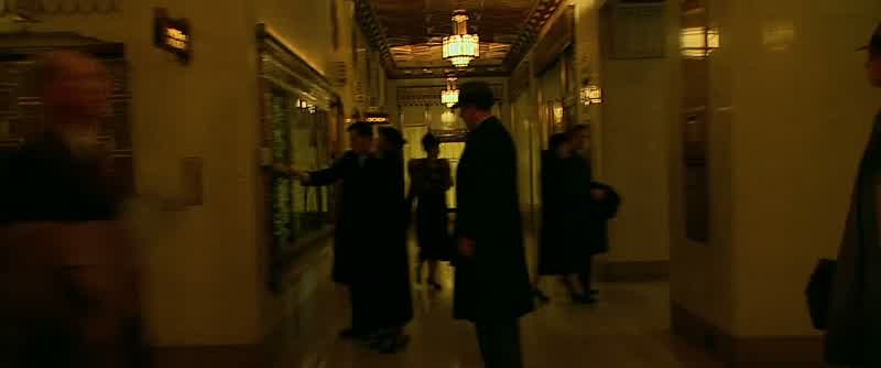 According to the bank teller Barbara Patzkethis is John Dillinger's coatIt's made by Shragge Quality out of St LouisPrice 35 windproof 32 ounce wool Top stitchingThank you Agent BaumAgents in our