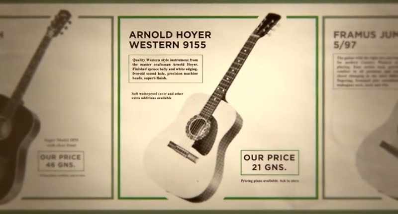 [acoustic guitar playing]