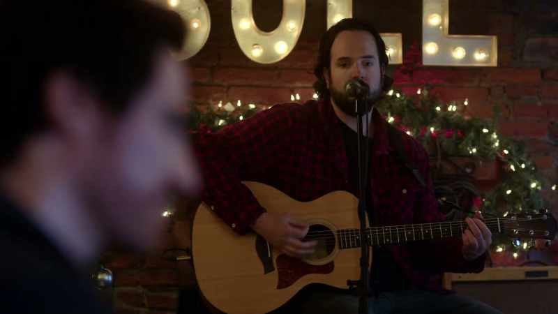 (acoustic guitar strumming)