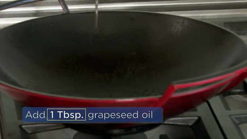 Add your grape-seed oil into the wok