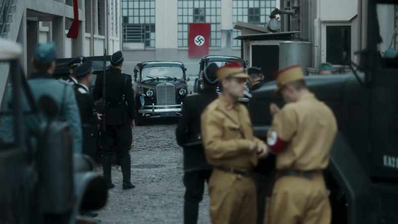 Adolf Hitler: [Speaking German on radio]