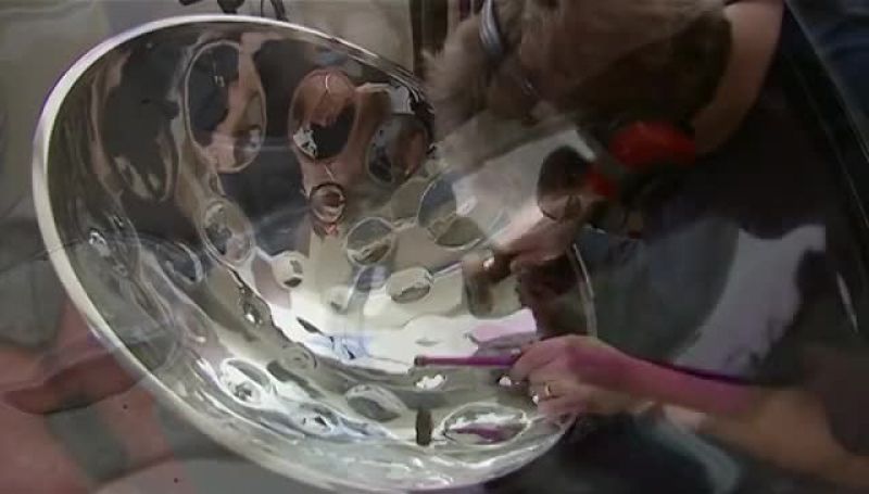 AFTER THE DRUM IS CHROME-PLATED, HE TUNES IT A FINAL TIME