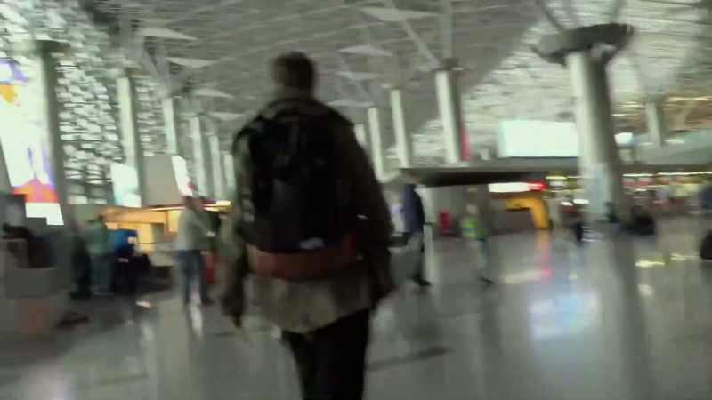 (airport chatter)