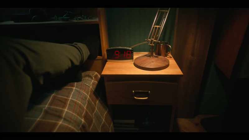 [alarm beeping]