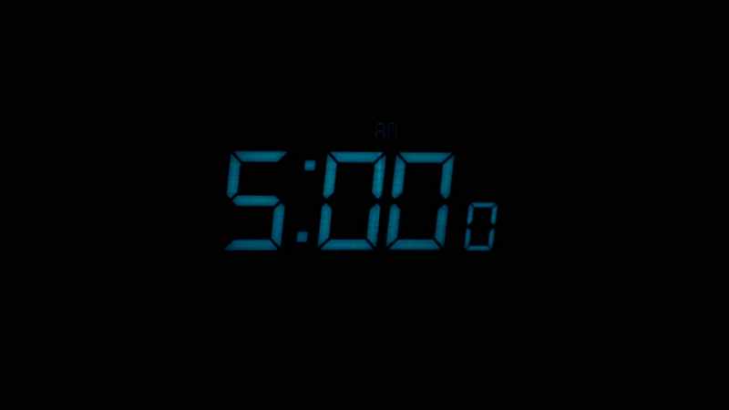 (alarm clock beeping)