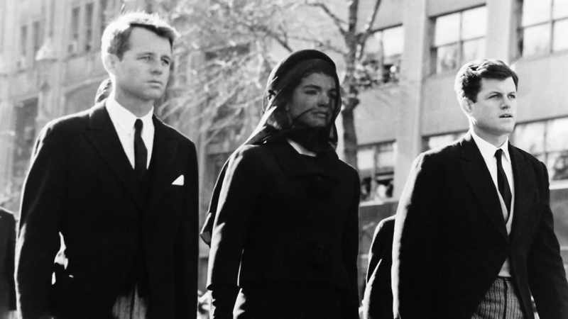 All follow behind the president's casket