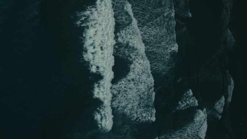 (ambient music, crashing waves)