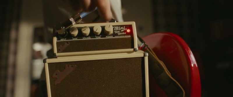 [amplifier beeps] -[rock music playing]