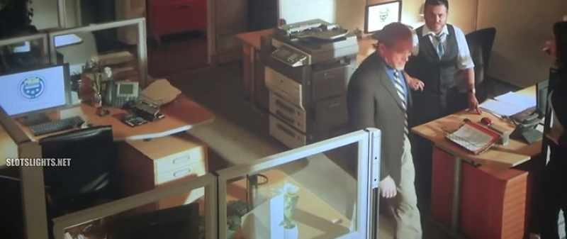 An elderly man walks into a fast food restaurant