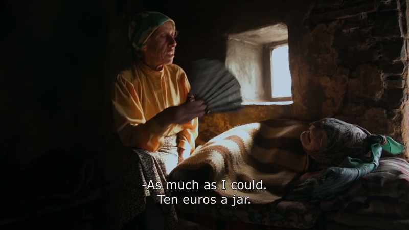 {\An8}As much as I could. 10 euros a jar. - Eh?