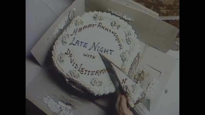 {\an8}[Bob Costas] It was Letterman's third anniversary show