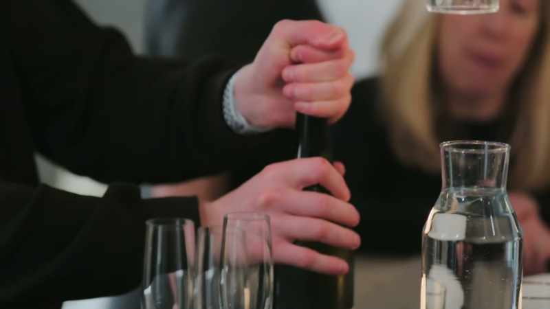 {\an8}[cork pops]