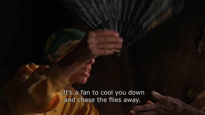 {\An8}It's a fan to cool you down and chase the flies away