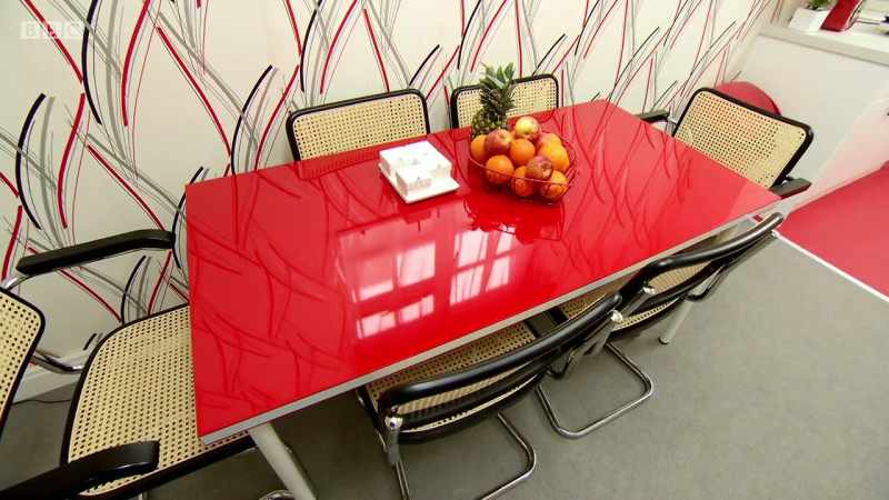 And a red plastic table, which you look at it and you think