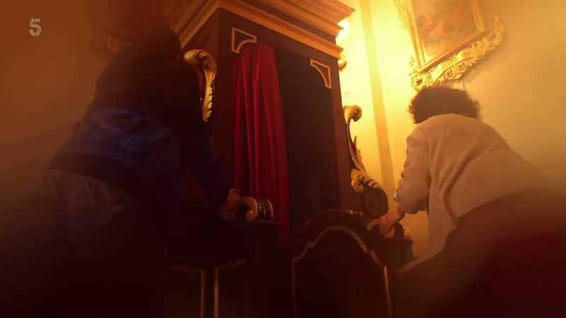 And while he was gone, you both slid the confessional box across
