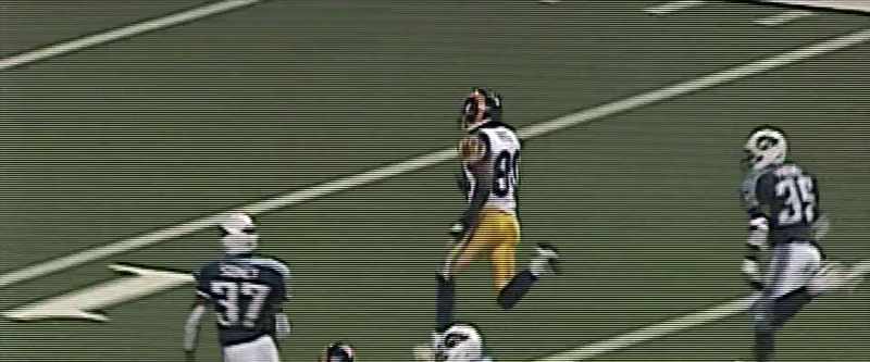 And Isaac Bruce threads his way for a touchdown!
