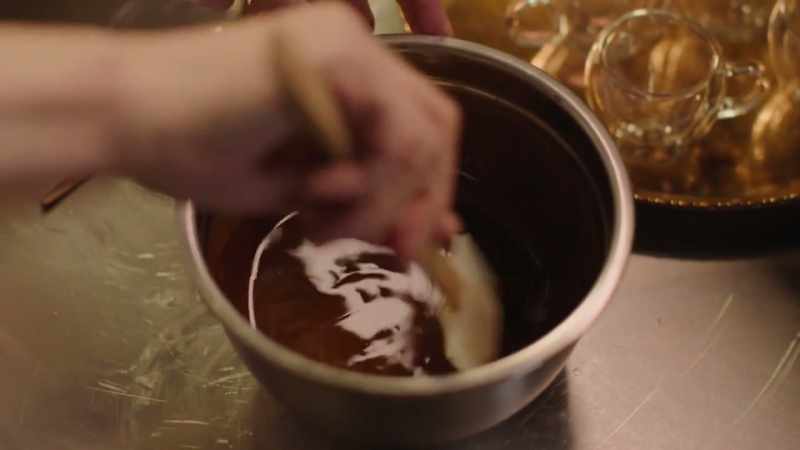 And now I'm going to pour this glossy mixture into the yolks