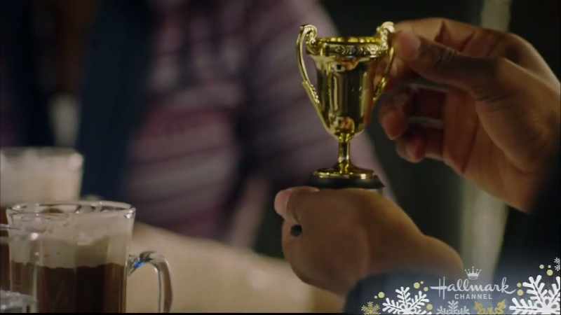 And presenting the trophy to the newly-crowned queen