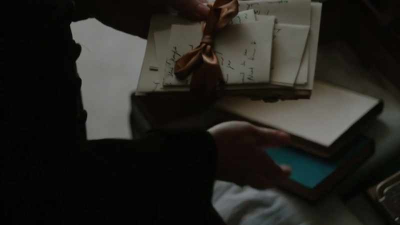 And when she opens his trunk, there is a packet of letters