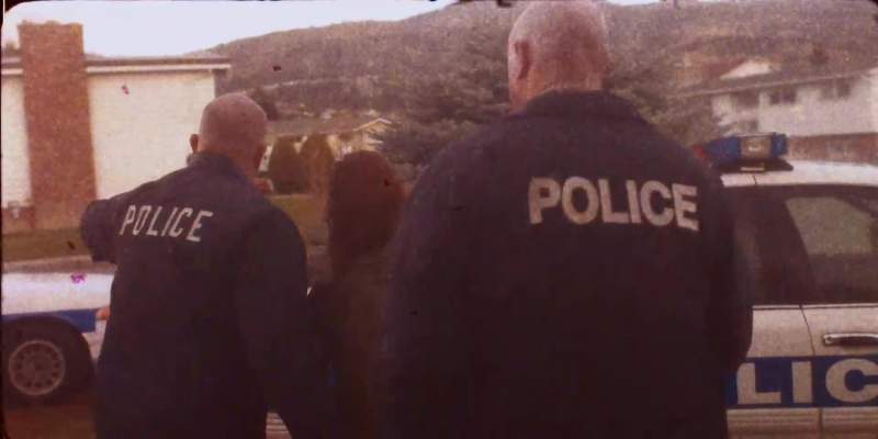 And she's being loaded into a squad car