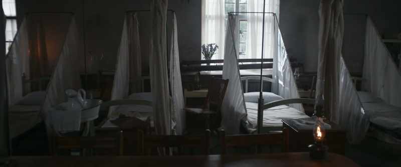 And some slight wound lay smiling on the bed