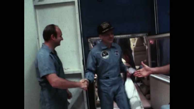 And stepping out first, commander neil armstrong