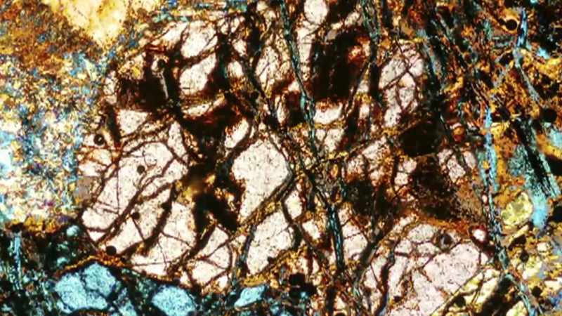 AND WE KNOW THAT IT CONTAINS TINY AMOUNTS OF IRON