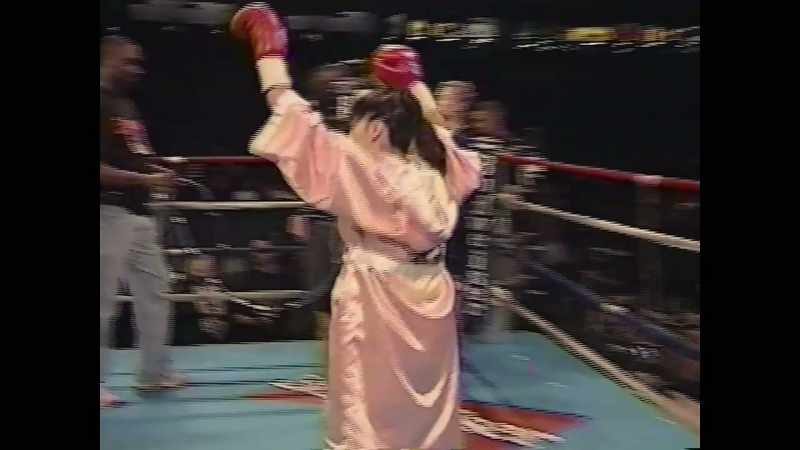 [announcer] Christy Martin! -[crowd cheering]