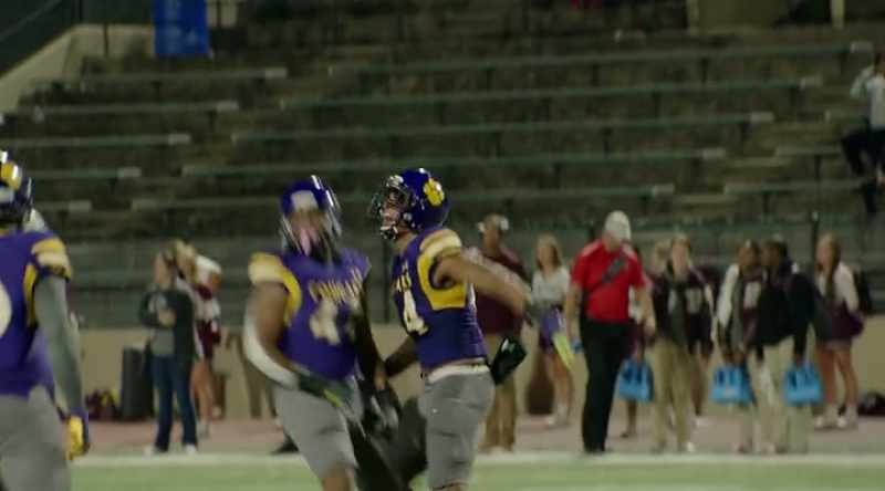 ANNOUNCER [over speaker]: Back deep for your Karr Cougars