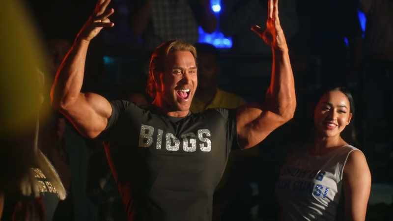 ANNOUNCER: Show us your guns. - (crowd cheering)